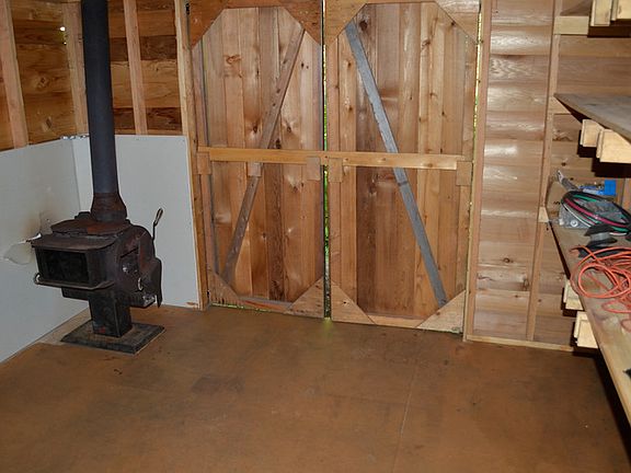 Shop space with wood stove.