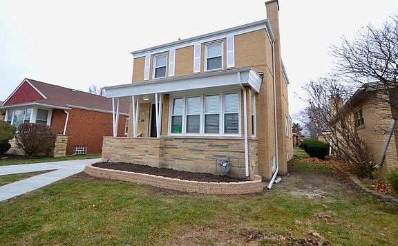Exterior view from North.   You can see the depth of the house from this angle.