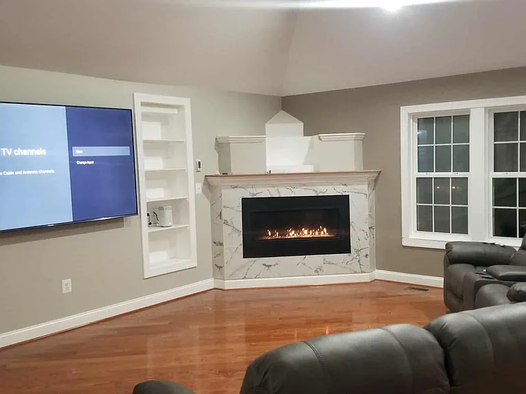 Custom Built Gas Fireplace and 95" TV