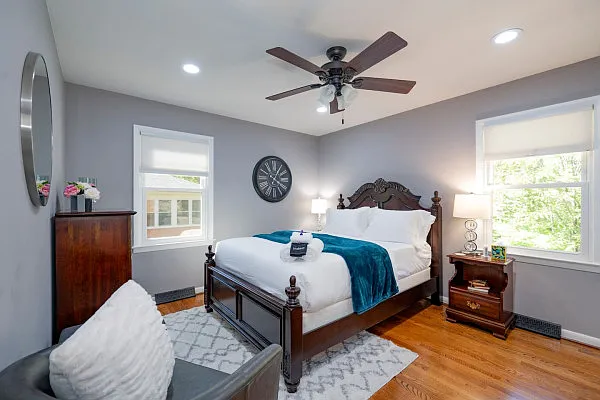Master BR with Queen Bed, Recessed Lighting, Lounging Chair, TV, Hardwood Floor