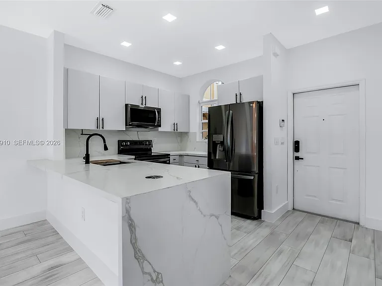 4977 SW 135th Way — Photo 5