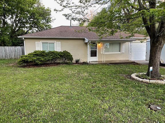 Summer - Front yard with maple tree & shrubs