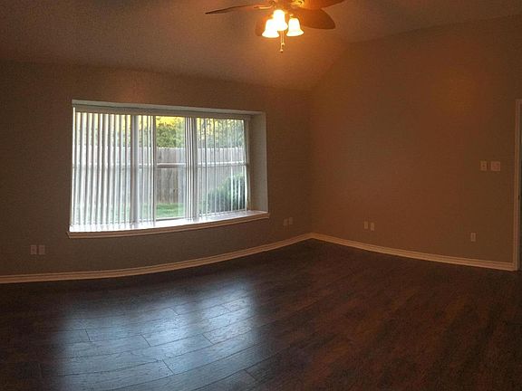 Master bedroom with vaulted ceiling