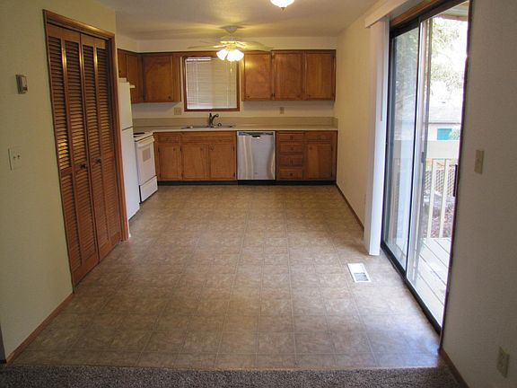 Kitchen with slider to an outdoor deck