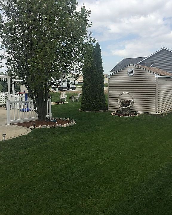 Landscaped with mature trees