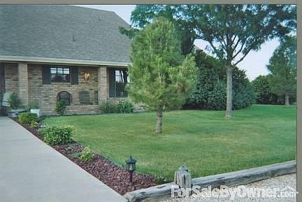 Beautiful Covered Porch
						:
						Porch Runs the Entire Length of the Home