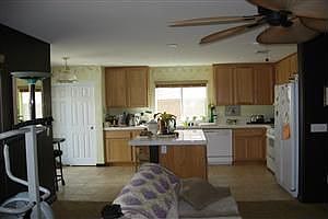 Large kitchen opens to backyard