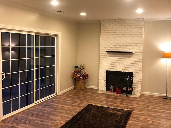 Living Room with access to deck and the backyard