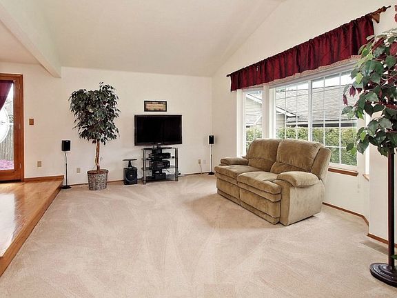 sunken living room with bay window