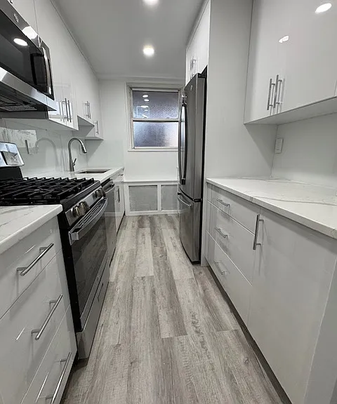 Kitchen with brand new GE stainless appliances (french door fridge, microwave, stove oven and dish washer)