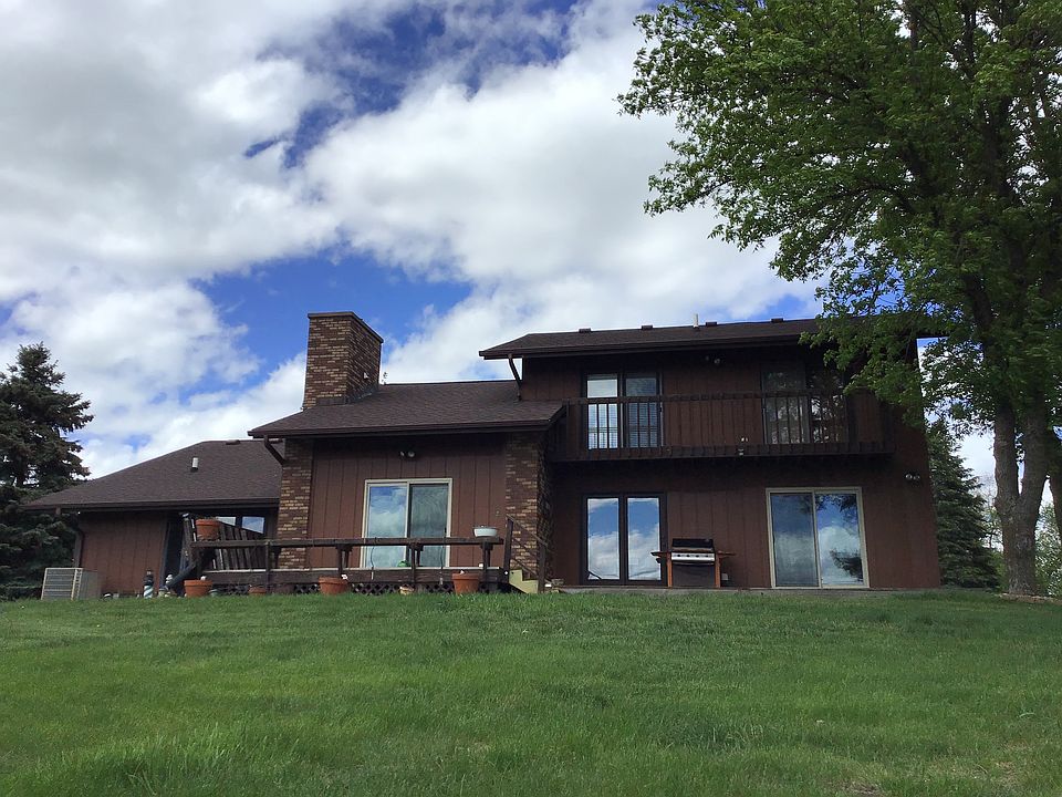 Back of house facing lake