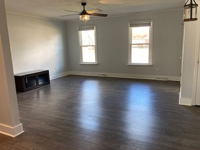 Living room- open concept, leading to the kitchen