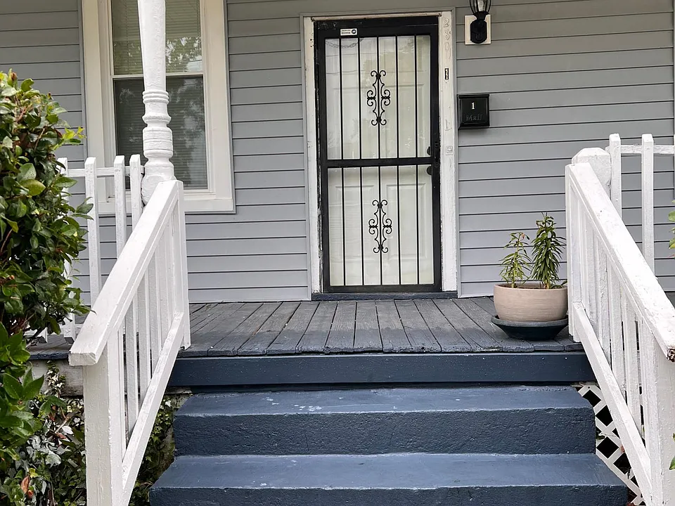 separate entrances with porches for lower units
