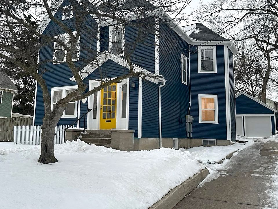 Front of house + driveway and garage