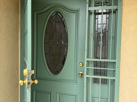 Custom metal door greets you in.