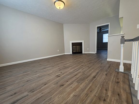 Living Room w/ fireplace (upper level)