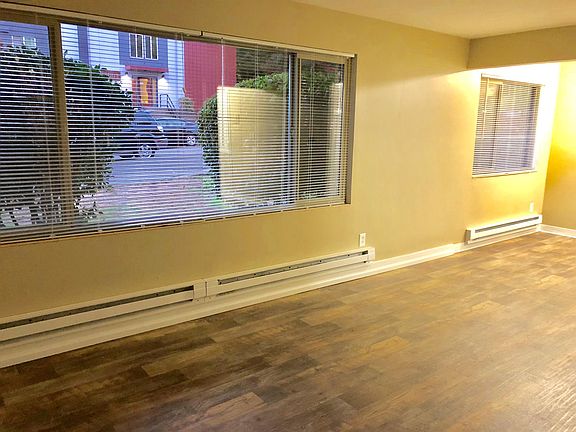 Livingroom w/street view, lots of natural light