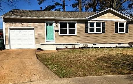 Front of house - Garage has laundry hookup.