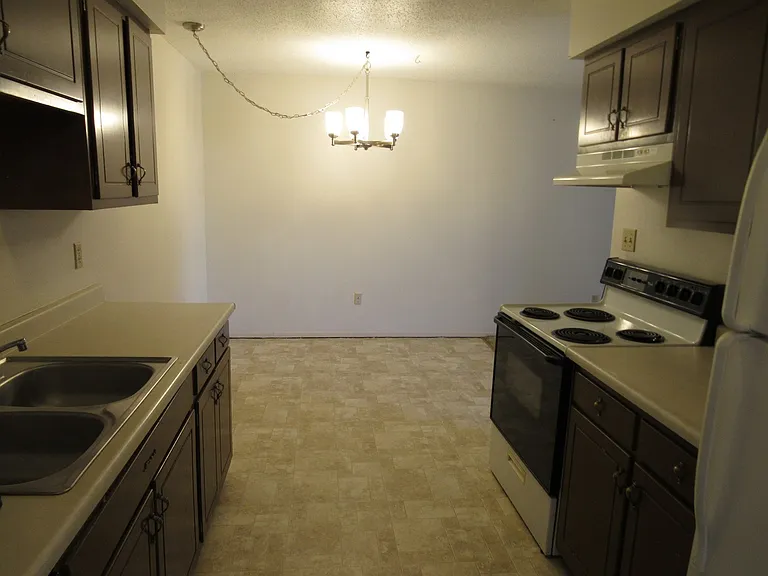 4500 S Poplar St #210 — Photo 3
