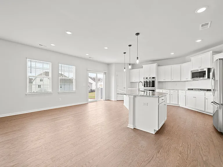 Stainless steel appliance and large island