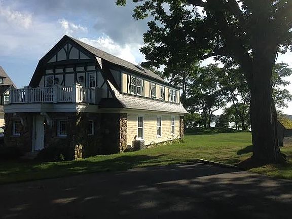 North entrance and back side of carriage house.