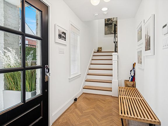 Front door and garage open to the ground level