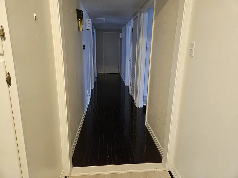 Hallway to bedrooms and main bath