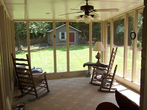 Screened in porch to huge, very private back yard