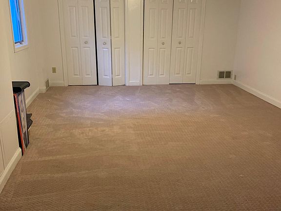 Huge lower level that can be a family room, bedroom, living room, office or hybrid master bedroom & office
