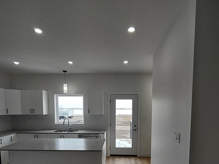 Balcony entrance into Kitchen