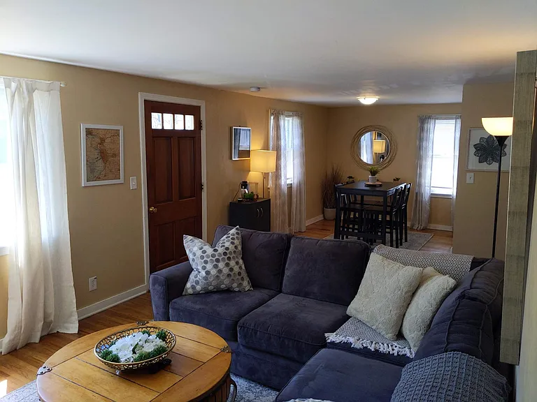 Open concept living room flows into the dining room