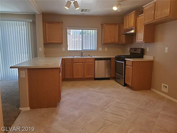 4th image of 9073 Mackanos Ave