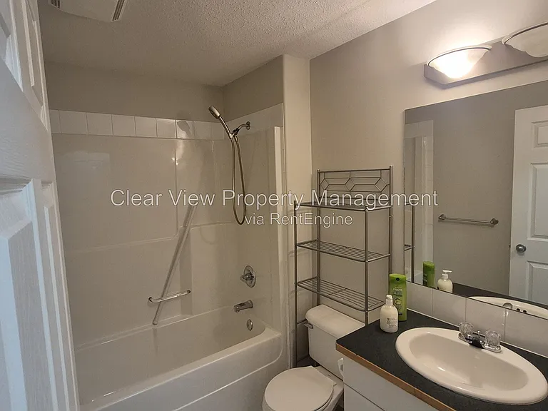 23 Chilcotin Ln W #212 — Photo 11