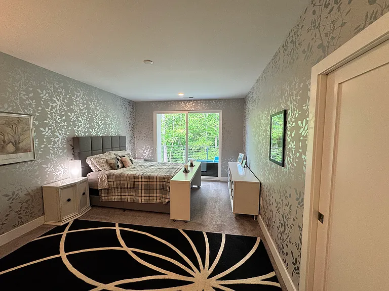 Primary bedroom at rear of upstairs