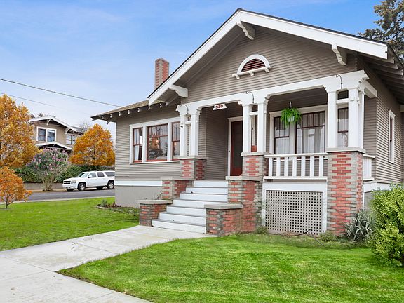 Covered front porch, New sidewalks.