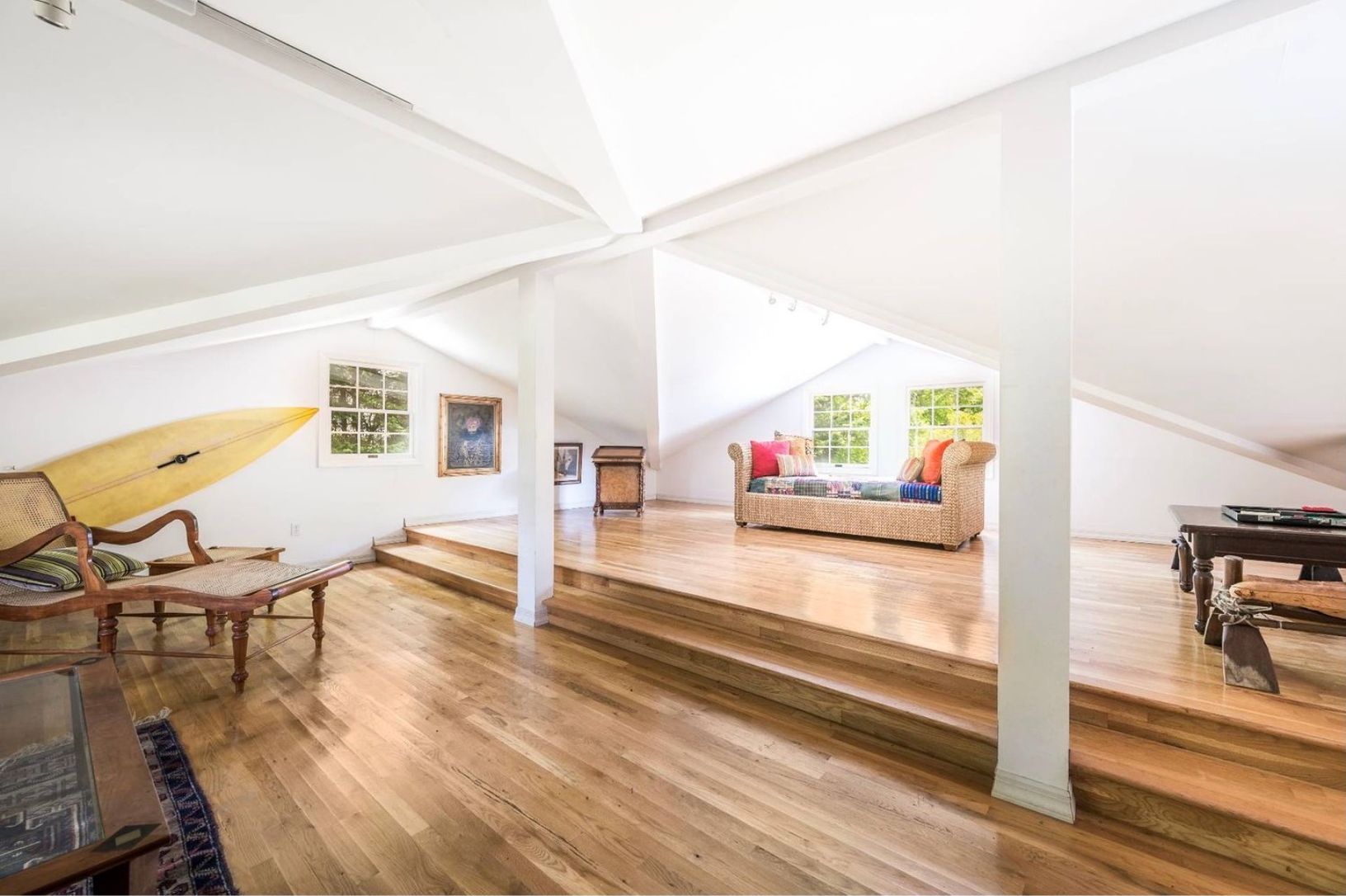  upstairs studio above garage with twin daybed, set up with TV, used for extra space