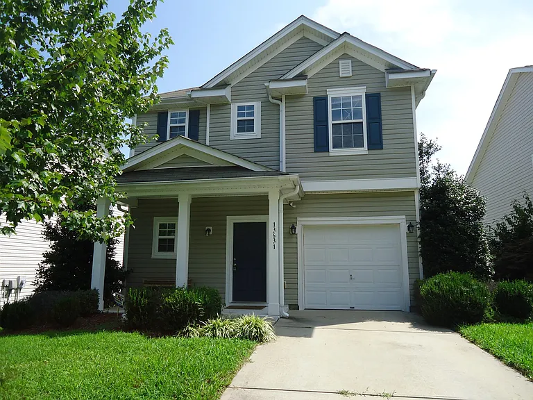 13631 Riding Hill Ave — Photo 1