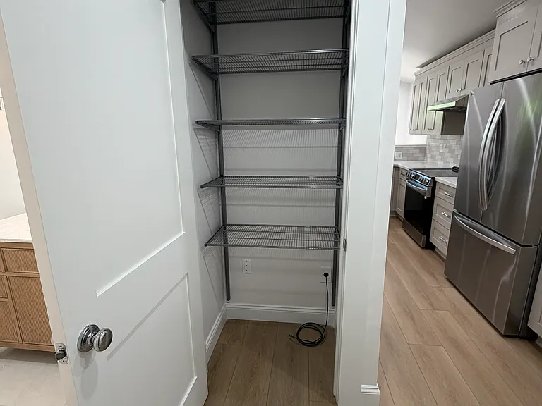 Ample Linen closet with hardwired Wifi
