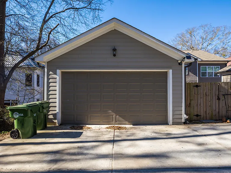 Spacious 2 car detached garage w/ private drive