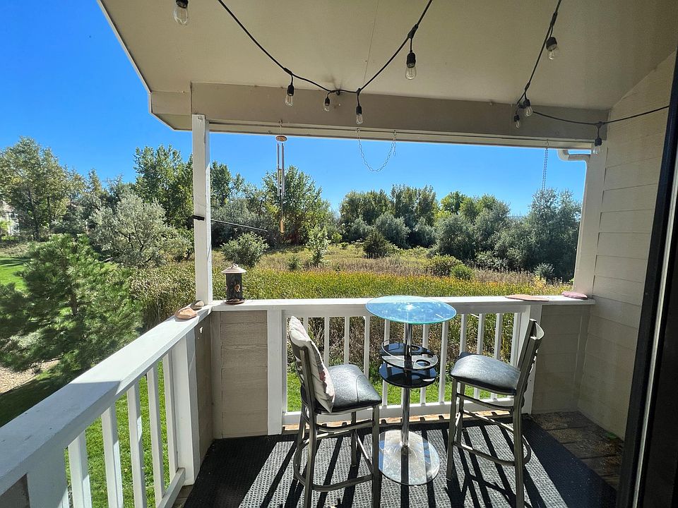 Patio looks over Twin Lakes open space