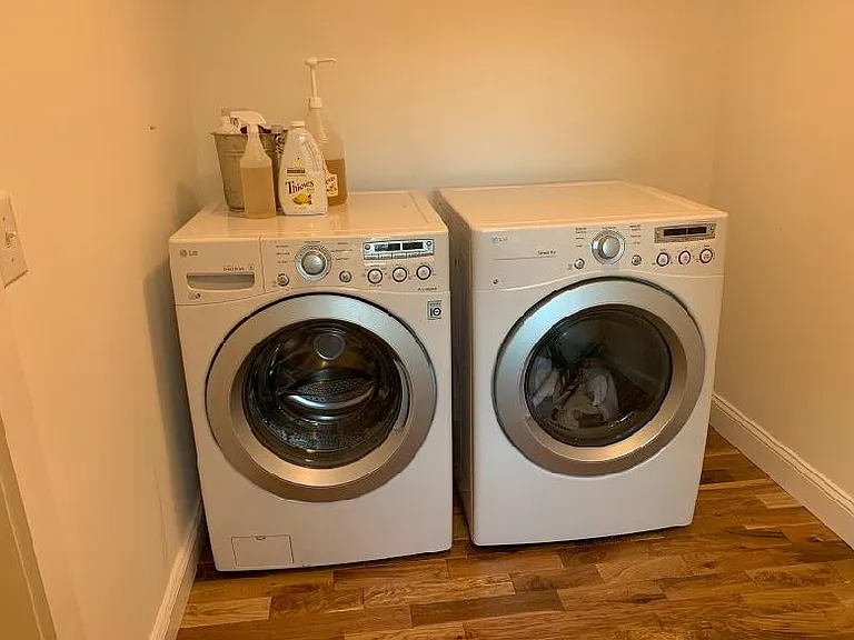 Large Laundry Room Off Primary Bathroom - perfect for additional storage