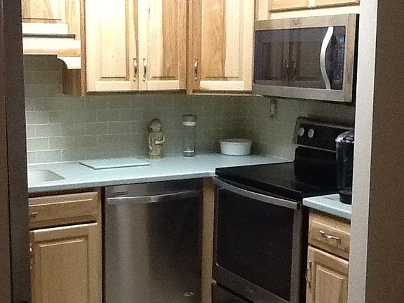 Hickory cabinets with corian