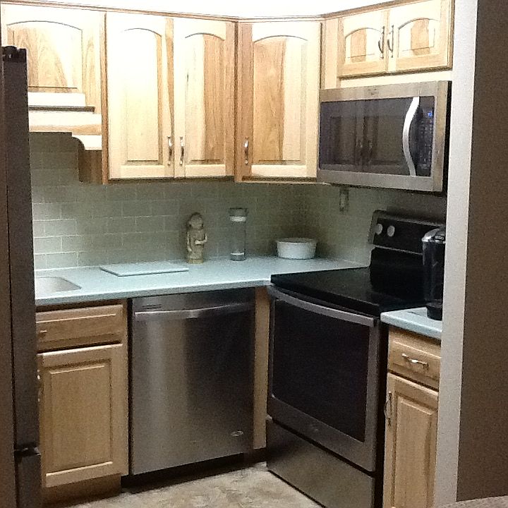 Hickory cabinets with corian