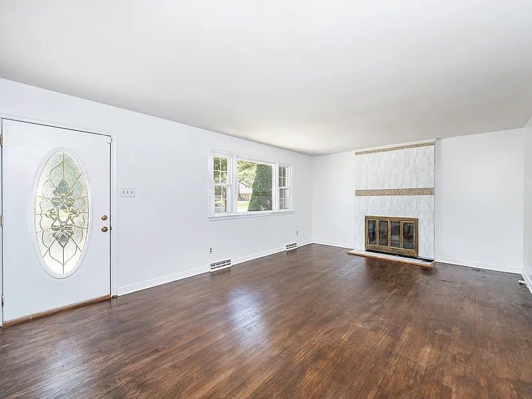 Enter into the front living room ( 1 of two living spaces)!