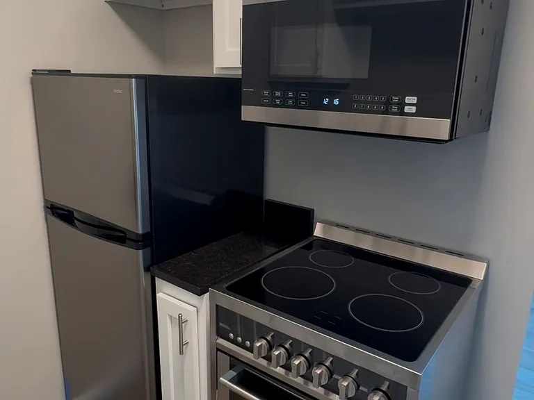 Stainless Mirco Fridge, Oven/Range & Microwave. New Cabinets