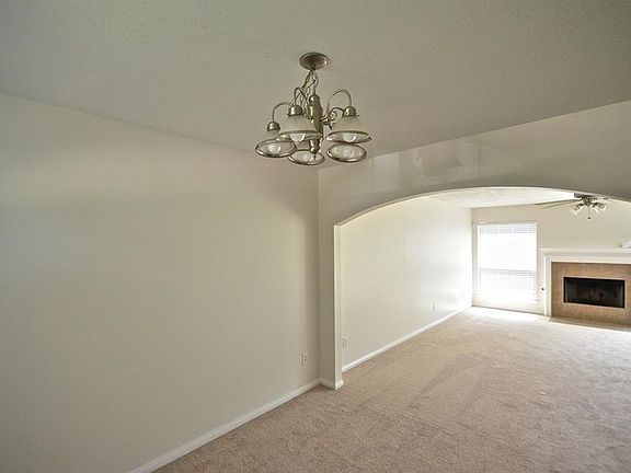 OPEN CONCEPT ALLOWS EASY ACCESS FROM FORMAL DINING ROOM TO FAMILY ROOM.