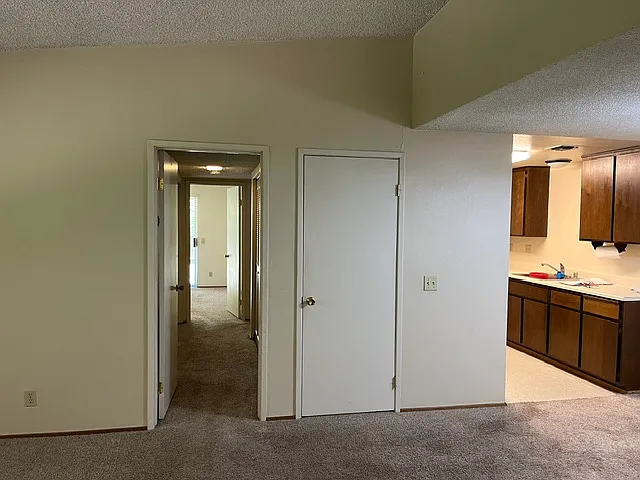 Hall way to bedrooms and bath