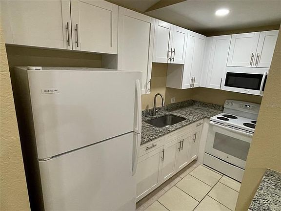 5th image of 9248 Lake Chase Island Way #9248
