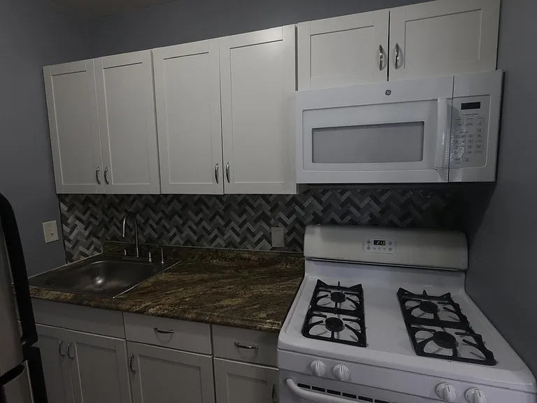 4645 Hillside Rd SE #1 — Photo 4