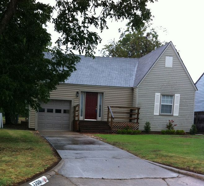 Front of house
						:
						New landscaping and front deck. Vinyl Siding. New overhead garage door.